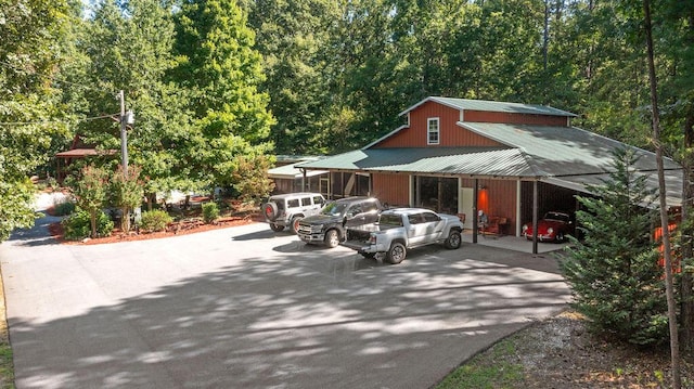 view of front of property with a carport