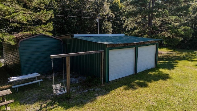 garage with a lawn