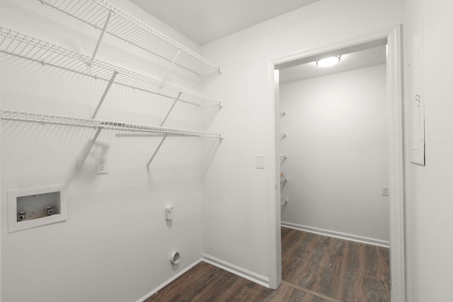 washroom with wood finished floors, electric dryer hookup, hookup for a washing machine, and baseboards