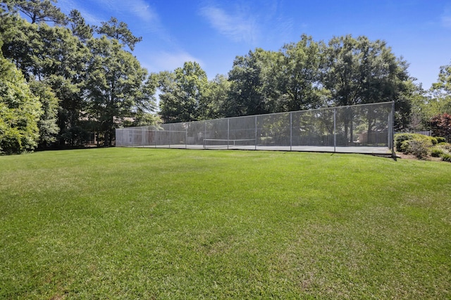 view of yard featuring tennis court