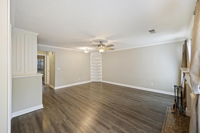 unfurnished living room with ceiling fan, dark hardwood / wood-style flooring, a textured ceiling, and ornamental molding