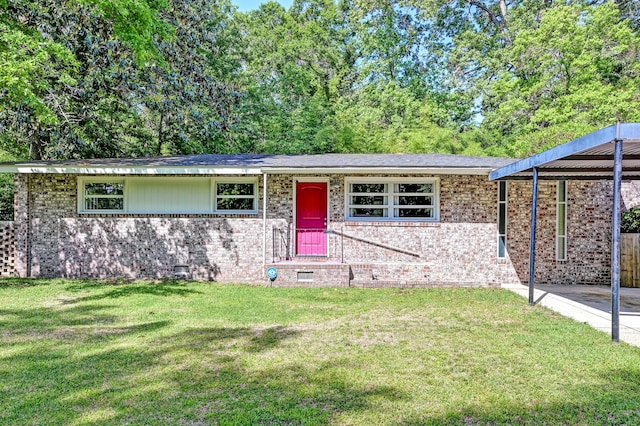 single story home with brick siding and a front lawn