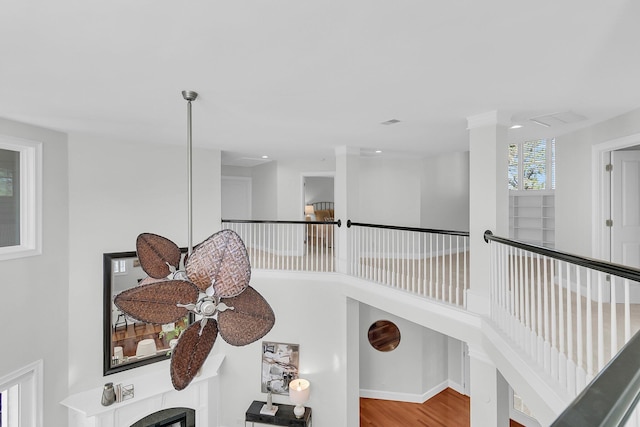 interior space with wood finished floors and baseboards