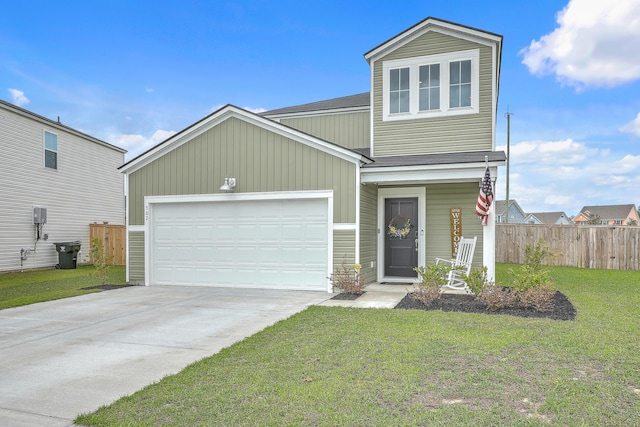 302 Fox Gap Rd, Summerville, SC 29486 - view of front facade featuring an attached garage, concrete driveway, fence, and a front lawn