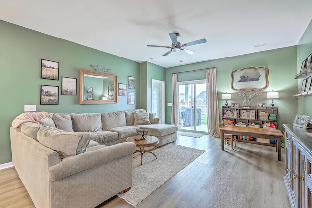 302 Fox Gap Rd, Summerville, SC 29486 - living area with wood finished floors, ceiling fan, and visible vents