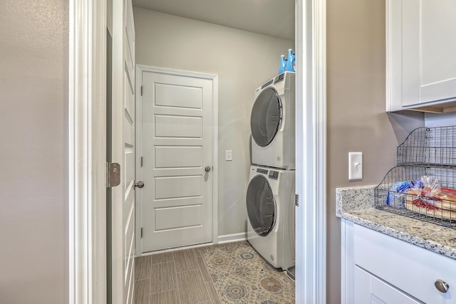 302 Fox Gap Rd, Summerville, SC 29486 - washroom with stacked washer / drying machine, laundry area, and baseboards