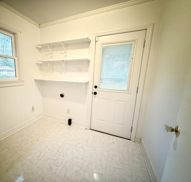 washroom with electric dryer hookup and ornamental molding