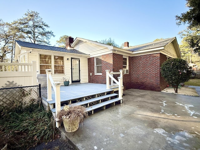 view of front of property with a deck