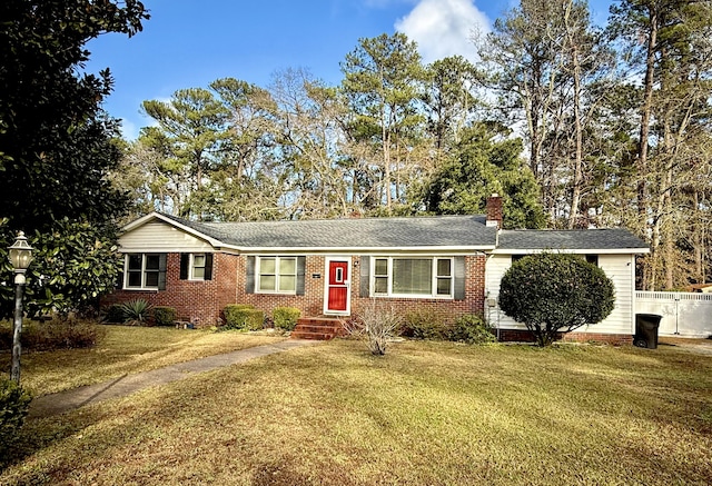 ranch-style home with a front lawn