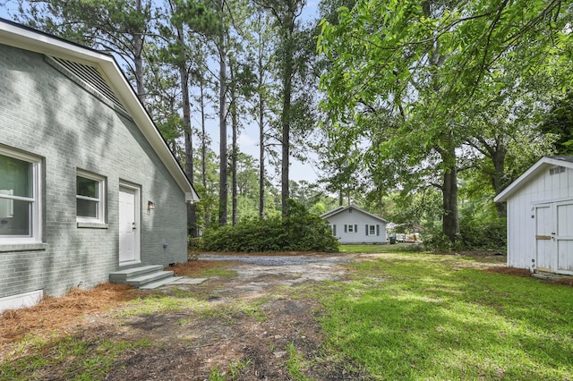 217 Quaker Rd, Saint George, SC 29477 - view of green lawn with entry steps