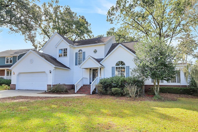 view of front of house featuring a front lawn and a garage