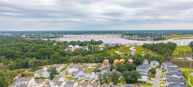 bird's eye view with a water view and a residential view