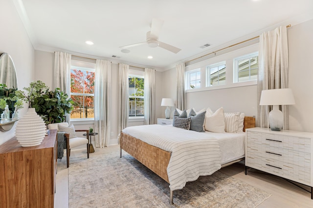 bedroom featuring crown molding, a ceiling fan, recessed lighting, and visible vents