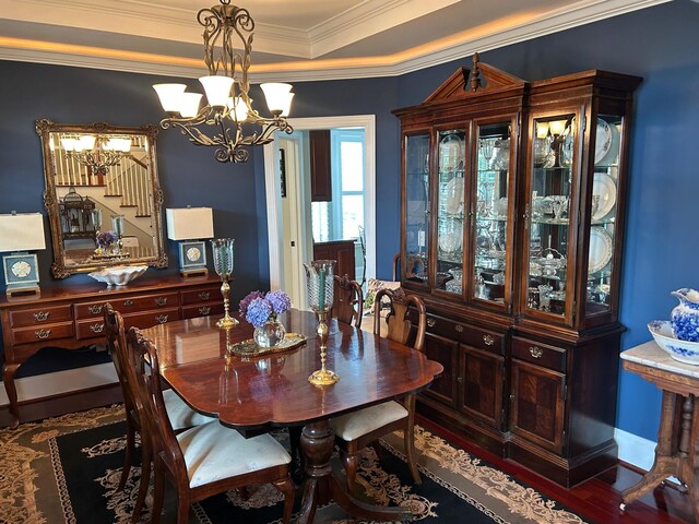 544 Two Mile Run, Johns Island, SC 29455 - dining room with a chandelier, ornamental molding, wood finished floors, and a raised ceiling