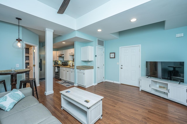 544 Two Mile Run, Johns Island, SC 29455 - living room featuring dark wood finished floors, decorative columns, and recessed lighting
