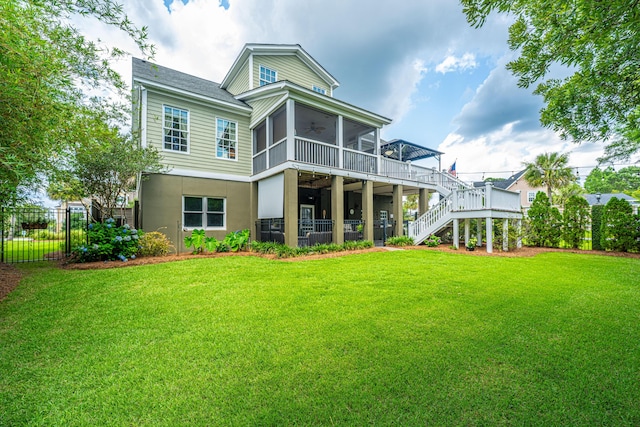 544 Two Mile Run, Johns Island, SC 29455 - rear view of house with ceiling fan, stairway, a sunroom, a wooden deck, and stucco siding