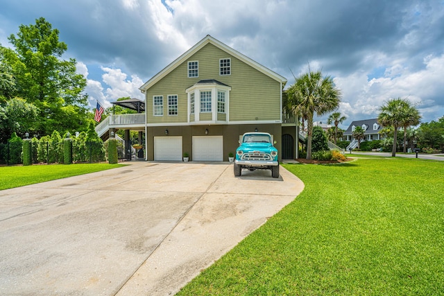 544 Two Mile Run, Johns Island, SC 29455 - view of front facade with an attached garage, driveway, and stucco siding