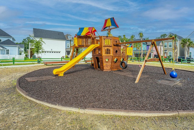 community jungle gym featuring a residential view