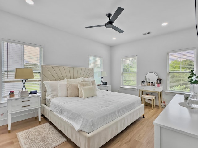 bedroom featuring ceiling fan and light wood-type flooring