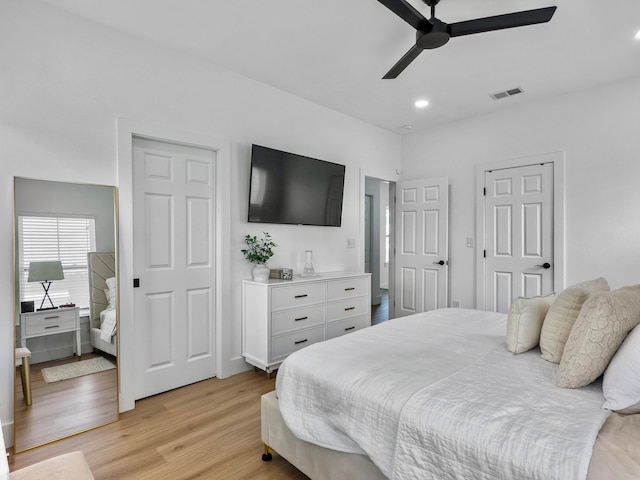 bedroom featuring ceiling fan and light wood-type flooring