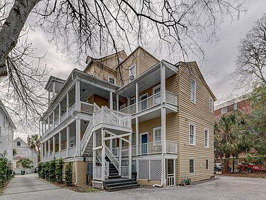65 Vanderhorst St Unit C, Charleston, SC 29403 - view of front of property with a balcony and asphalt driveway