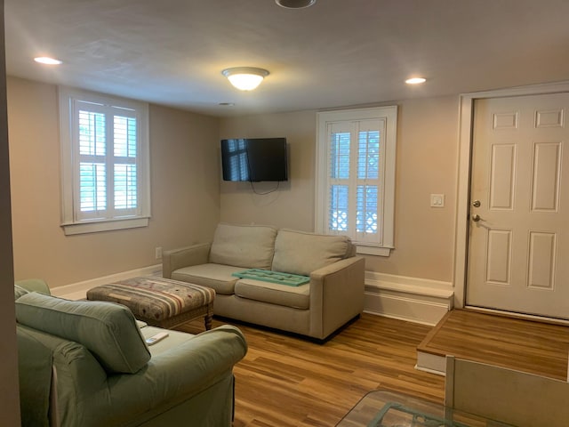 65 Vanderhorst St Unit C, Charleston, SC 29403 - living area featuring healthy amount of natural light, wood finished floors, baseboards, and recessed lighting