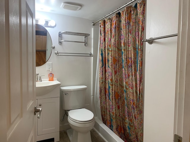 65 Vanderhorst St Unit C, Charleston, SC 29403 - full bath with vanity, toilet, tile patterned floors, and curtained shower
