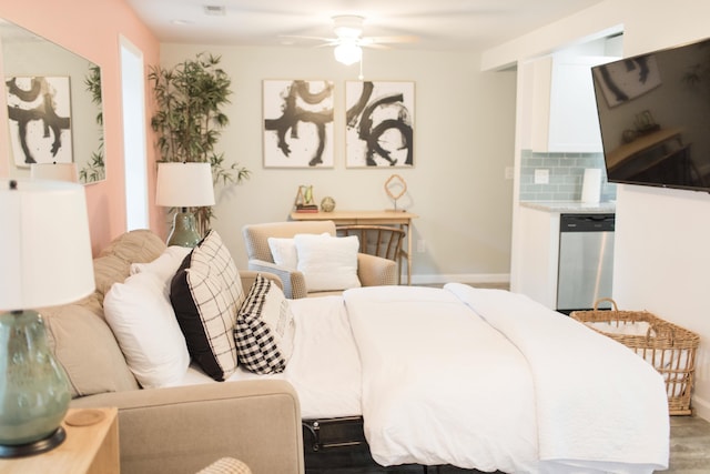 bedroom with ceiling fan and light hardwood / wood-style flooring