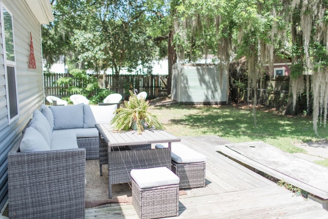 view of patio featuring an outdoor living space and a deck