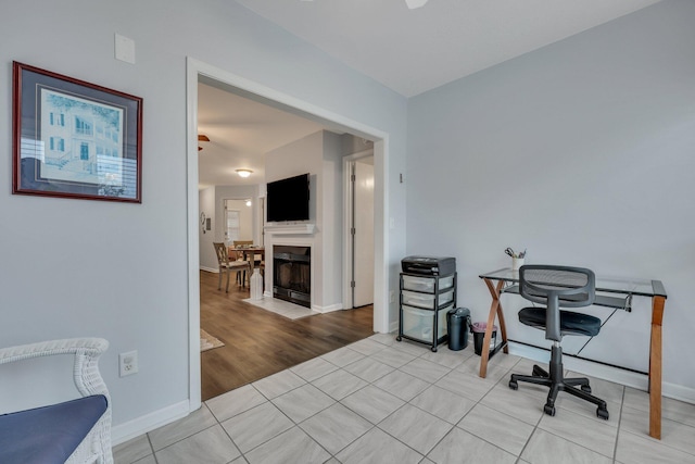 office space featuring light tile patterned floors