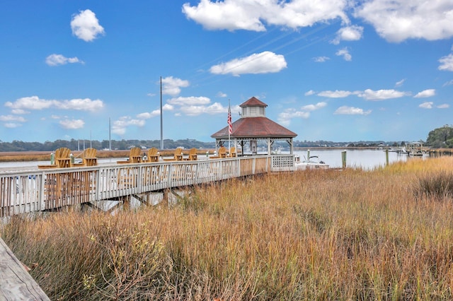 dock area featuring a gazebo and a water view