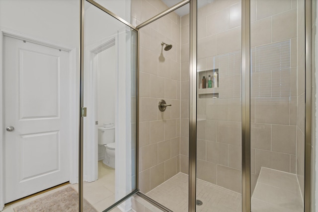 101 Caleb Ct, Ladson, SC 29456 - bathroom featuring a stall shower, toilet, and tile patterned flooring