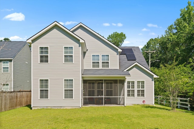 101 Caleb Ct, Ladson, SC 29456 - back of house featuring a sunroom, solar panels, and a shingled roof