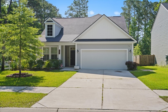 101 Caleb Ct, Ladson, SC 29456 - view of front of house featuring a garage, driveway, and board and batten siding
