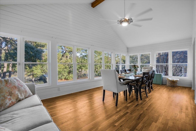 sunroom / solarium featuring lofted ceiling with beams and ceiling fan