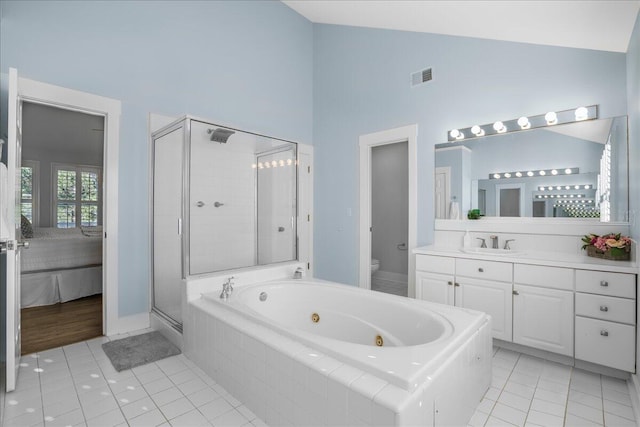 full bathroom featuring tile patterned flooring, high vaulted ceiling, and independent shower and bath