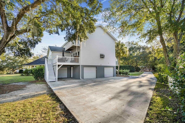 view of side of home featuring a garage