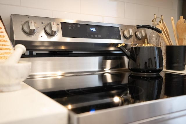 interior details with stainless steel electric range