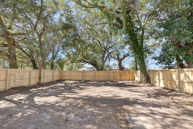 view of yard featuring a fenced backyard