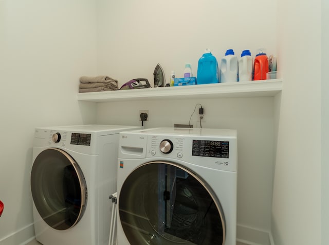 laundry area featuring washing machine and dryer