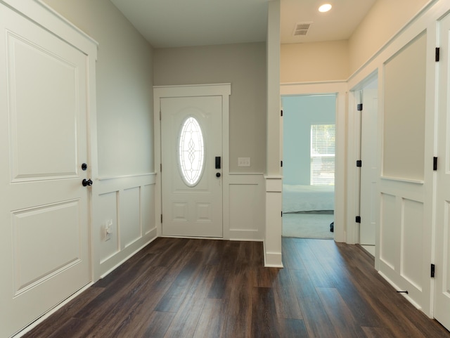 entrance foyer featuring dark wood-type flooring