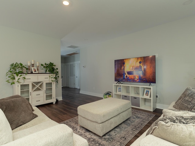 living room with dark hardwood / wood-style floors