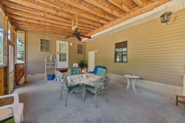 view of patio / terrace with outdoor dining area and a ceiling fan