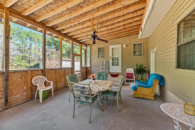 sunroom featuring ceiling fan