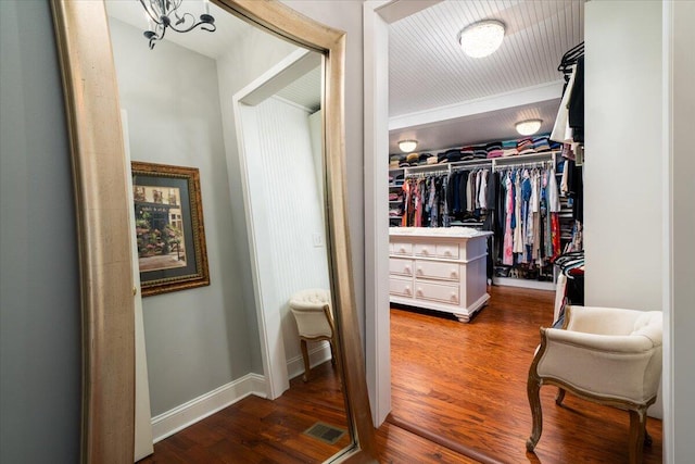 spacious closet featuring hardwood / wood-style flooring