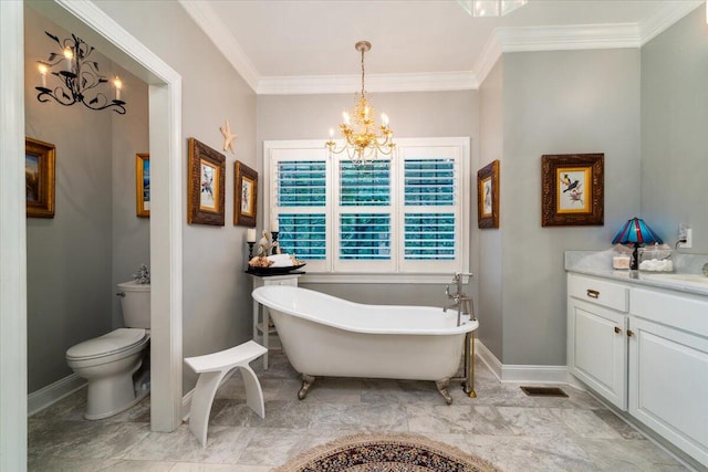 bathroom featuring tile patterned floors, a chandelier, vanity, crown molding, and toilet