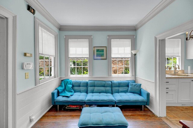 197 Coming St, Charleston, SC 29403 - living area with hardwood / wood-style floors, visible vents, ornamental molding, and wainscoting