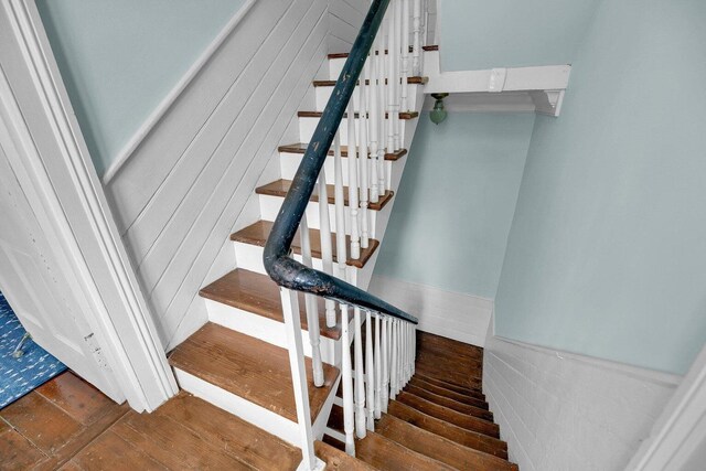 197 Coming St, Charleston, SC 29403 - stairs featuring hardwood / wood-style flooring and wainscoting