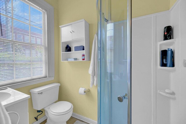 197 Coming St, Charleston, SC 29403 - full bathroom featuring an enclosed shower, a wealth of natural light, toilet, and vanity