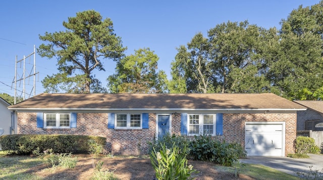 ranch-style home featuring a garage